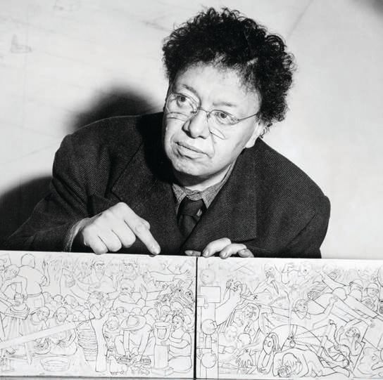 The artist holds plans for the mural in 1940, part of the Golden Gate International Exposition. PHOTO: COURTESY OF SAN FRANCISCO HISTORY CENTER, SAN FRANCISCO PUBLIC LIBRARY