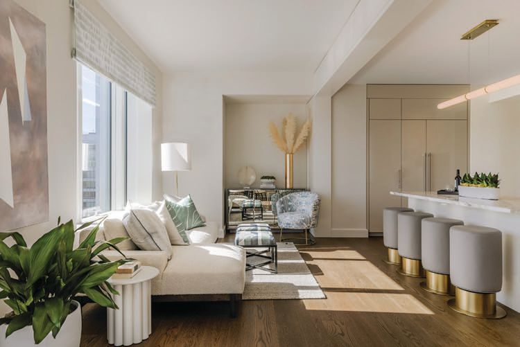 Family rooms in tower condos offer distinct areas for quiet moments or intimate conversations with guests. PHOTO COURTESY OF 706 MISSION STREET CO.