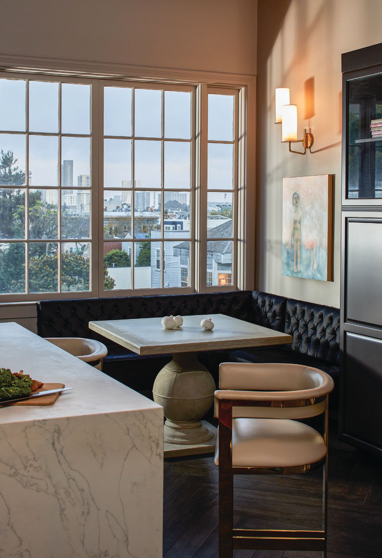A custom cowhide banquette offers exceptional views of the city. PHOTOGRAPHED BY HELYNN OSPINA