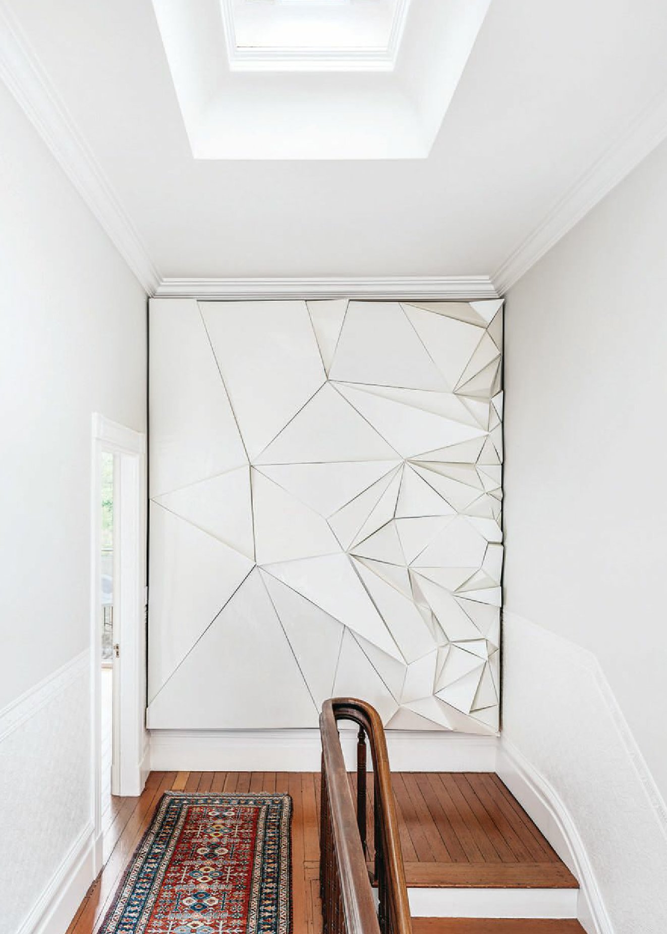 A wall sculpture by SF-based artist Jud Bergeron dominates the hallway PHOTOGRAPH BY CHRISTOPHER STARK