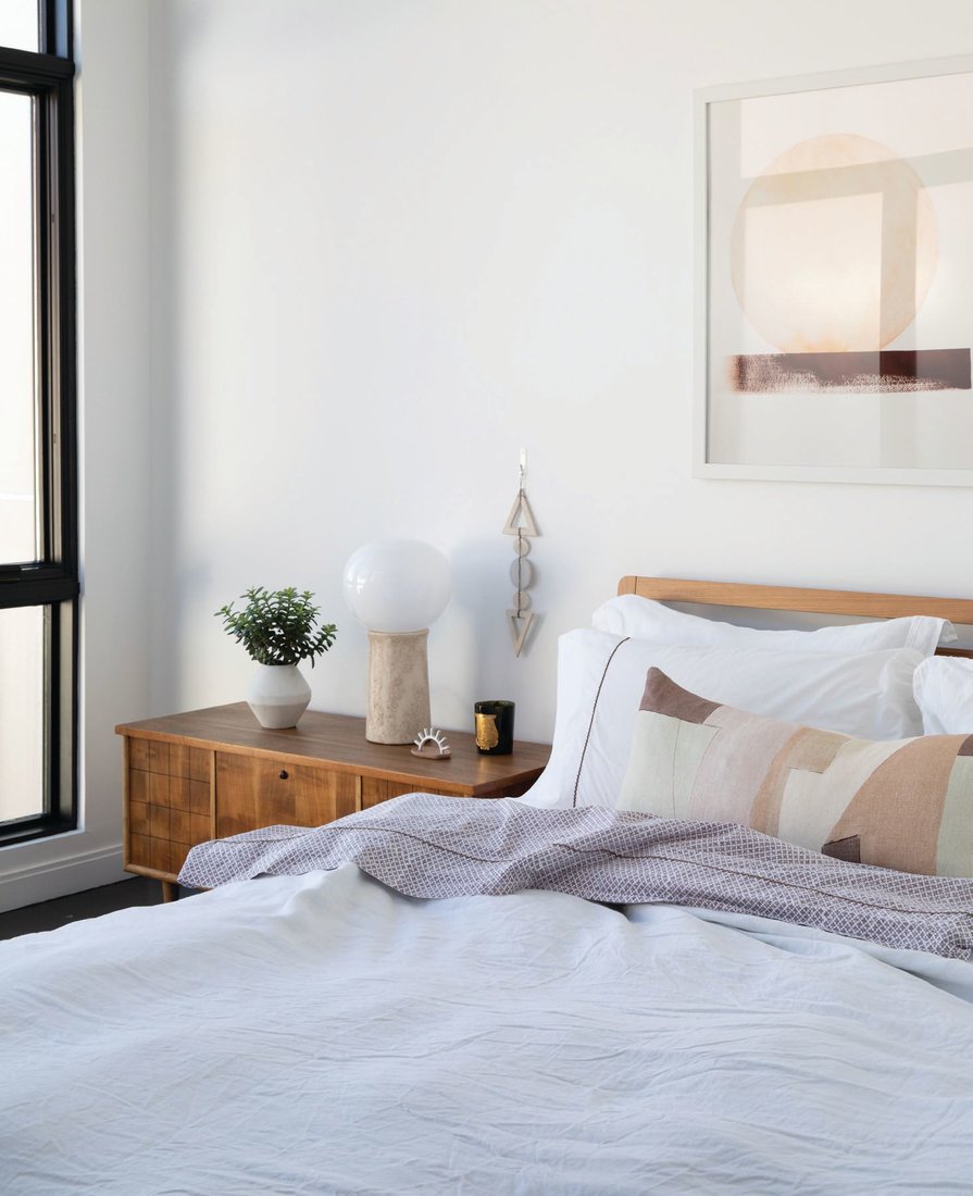 The guest bedroom houses the Woodrow bed by Blu Dot in walnut. PHOTOGRAPHED BY BESS FRIDAY