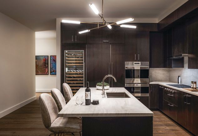A chef’s kitchen, which is perfect for entertaining, graces each condo in Aronson. PHOTO COURTESY OF 706 MISSION STREET CO.