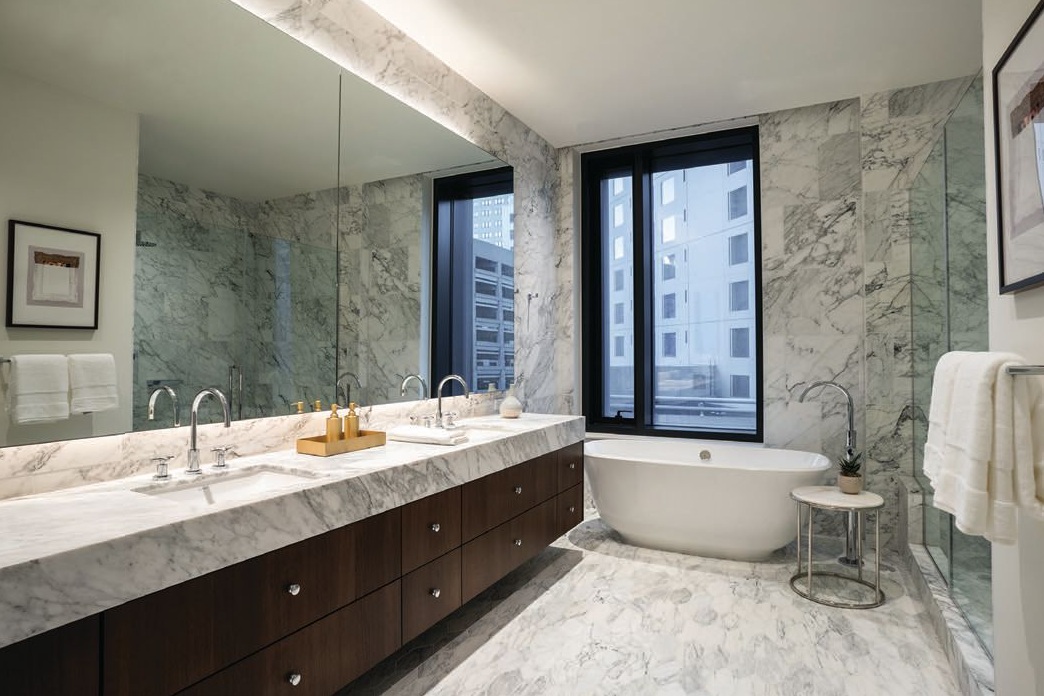 A sleek, spalike bath in one of the condos located in the Aronson Building PHOTO COURTESY OF 706 MISSION STREET CO.