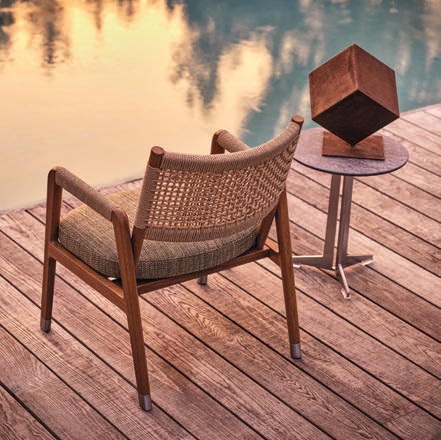 The structure of the Ortigia armchair is made entirely of solid iroko, artisan-crafted with techniques that call to mind the tradition of fine cabinetmaking PHOTO COURTESY OF FLEXFORM