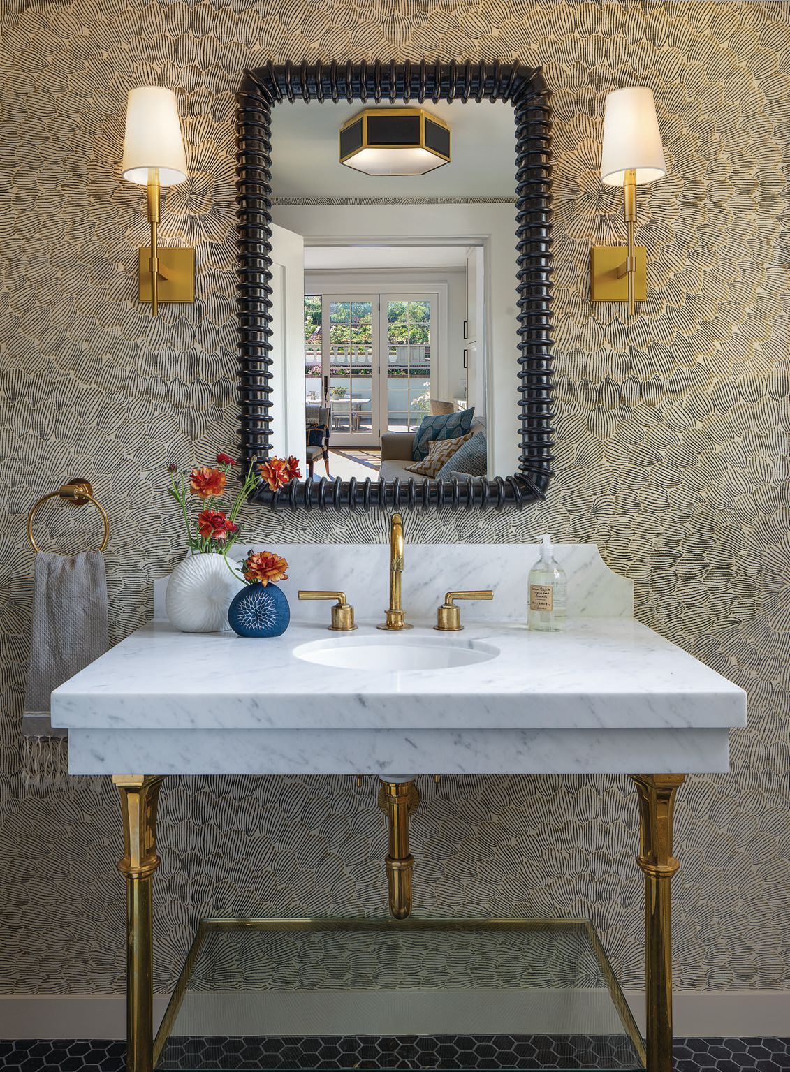 The team from LMB Interiors chose bold hues and jewel tones in a hall bathroom. PHOTOGRAPHED BY PAUL DYER AND TIM COY