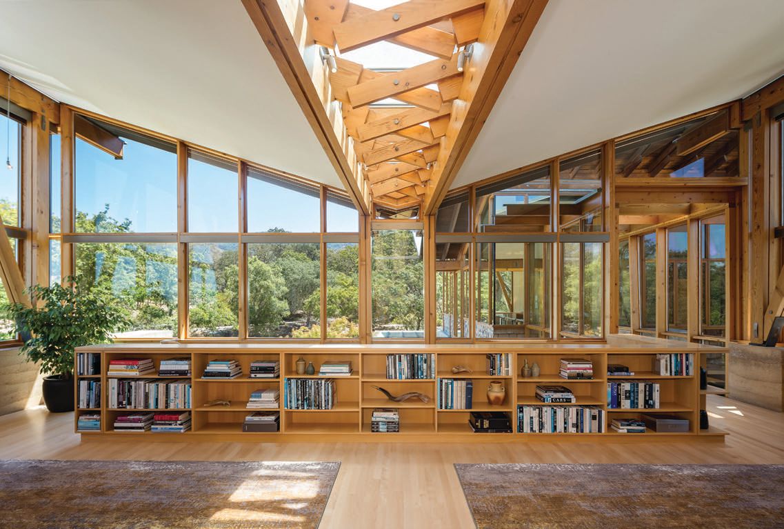 Cozy up with a riveting book in the jaw-dropping library PHOTO BY ADAM POTTS