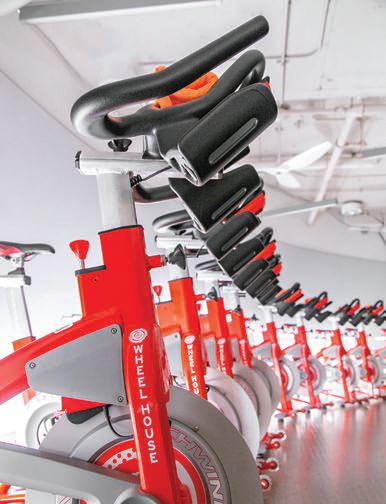 Level up your workout in a spin class at Wheel House. PHOTO COURTESY OF BRANDS